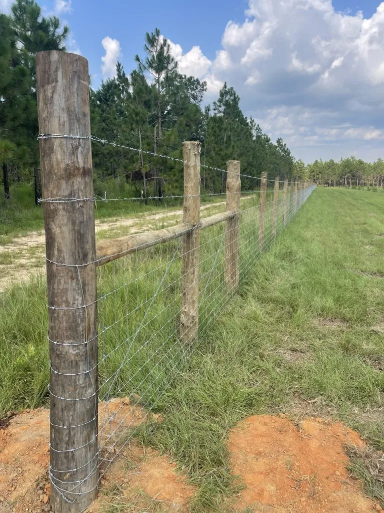 Rustic wire agricultural fence made by bomann fencing